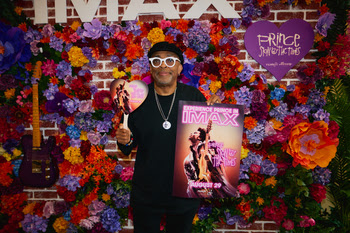 Spike Lee on the purple carpet at AMC Kips Bay for the Prince: Sign o’ the Times IMAX screening in New York City. [Photo Credit: Calvin Stark/Erin Hoagg]