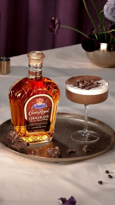 Bottle of Crown Royal Chocolate Flavored Whisky with chocolate cocktail garnish on a tray