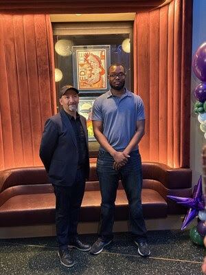 Prairie State College Art Gallery Director Javier Chavira with inaugural featured artist Chidera Onyeizeh at Wind Creek Chicago Southland Art Showcase.