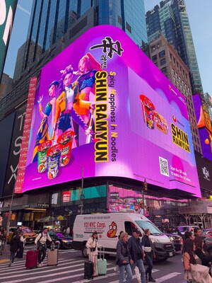 Nongshim Shin Ramyun and KPop Demon Hunters billboard lights up New York Times Square.
