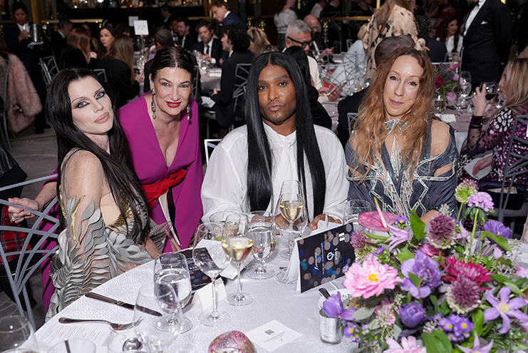 Julia Fox, Maryanne Grisz, Law Roach, and Iris Van Herpen seated together at the 41st Annual FGI Night of Stars Gala at The Rainbow Room in New York City.