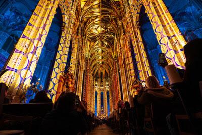 Audience inside the Cathedral Basilica of Saints Peter and Paul during the immersive LUMINISCENCE light and music experience in Philadelphia