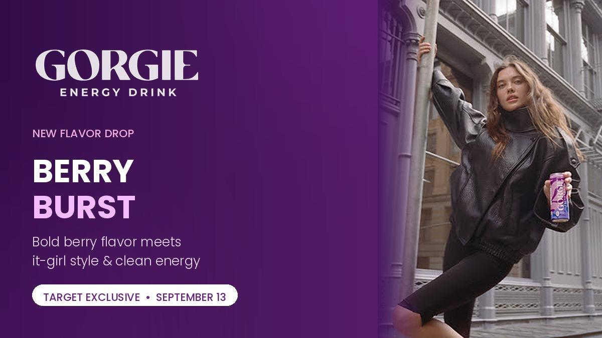 GORGIE Berry Burst launch graphic with a model in a black leather jacket holding the purple energy drink can on a New York City street
